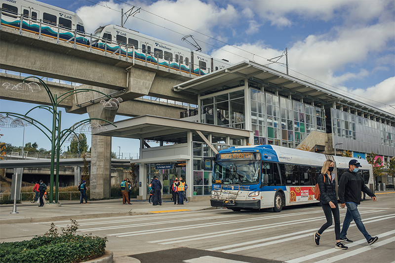 Community Transit bus with passengers at station 